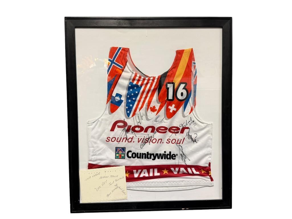 FRANZ WEBER AUTOGRAPHED #16 1999 FIS ALPINE VAIL WORLD SKI CHAMPIONSHIP RACING BIB: SIGNED BY OTHER RACERS AS WELL INCLUDING ERIC GAY, HERMANN MAIER, TORIL FORLAND, AND MORE, FRAMED 22" X 26" FRAME