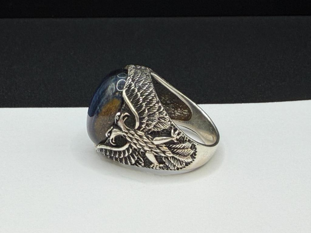 TWO MEN'S STERLING SILVER EAGLE MOTIF BLUE TIGER'S EYE CABOCHON RINGS - 7