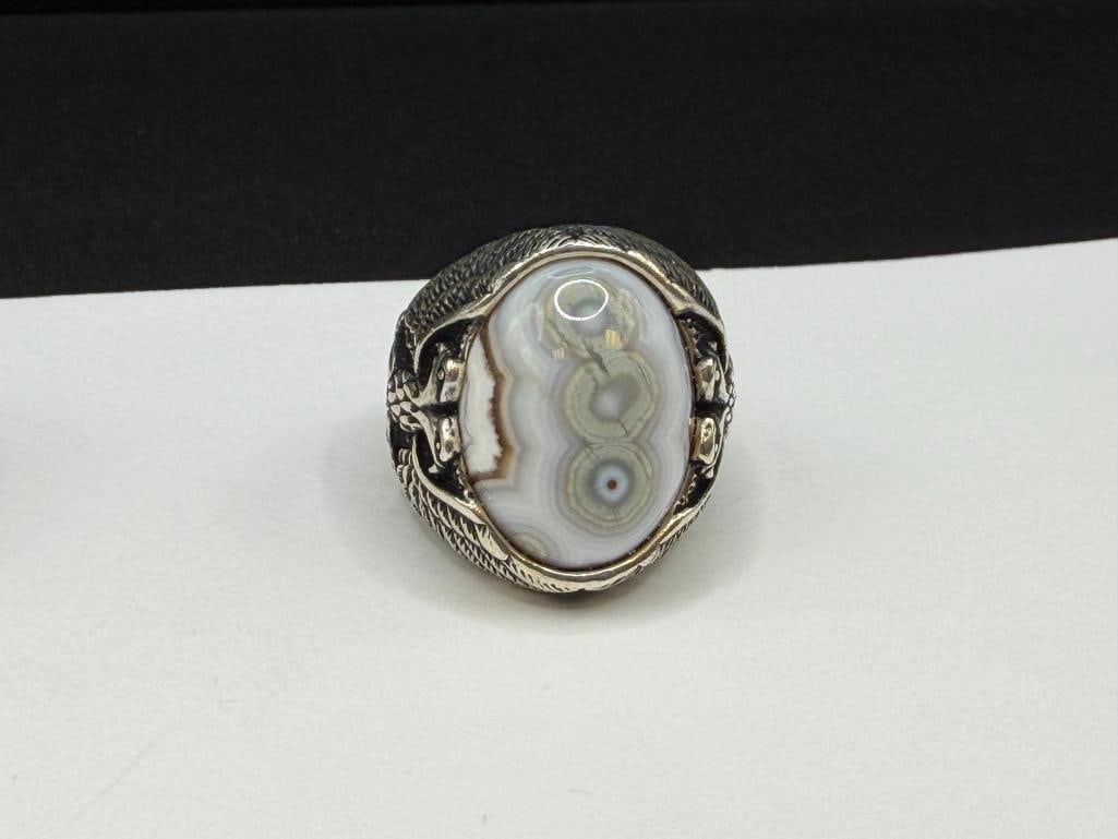 TWO MEN'S STERLING SILVER EAGLE MOTIF RINGS INCLUDING ONE WITH NATURAL EYE AGATE CABOCHON - 5