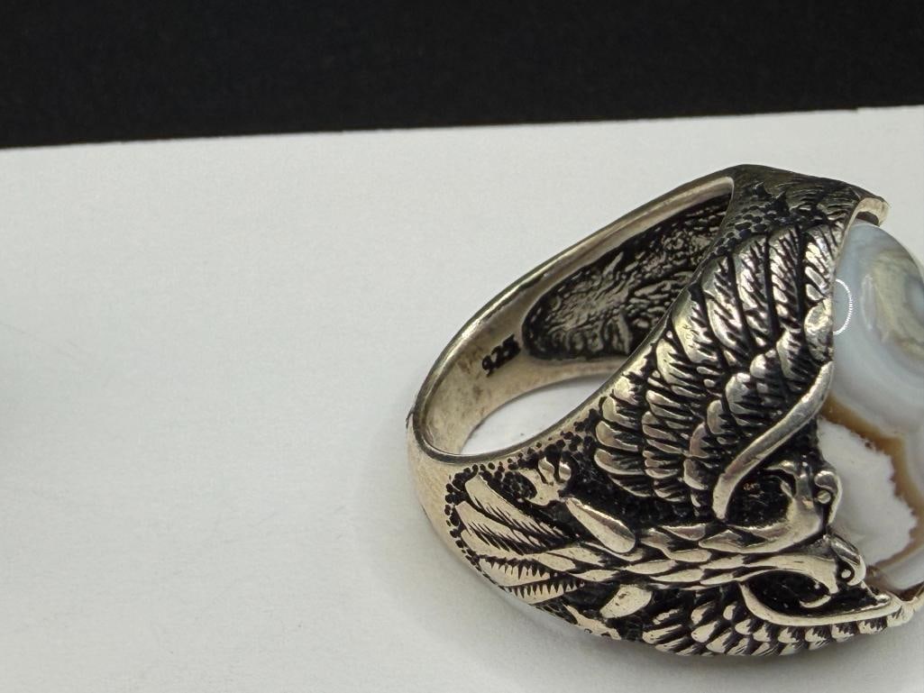 TWO MEN'S STERLING SILVER EAGLE MOTIF RINGS INCLUDING ONE WITH NATURAL EYE AGATE CABOCHON - 7