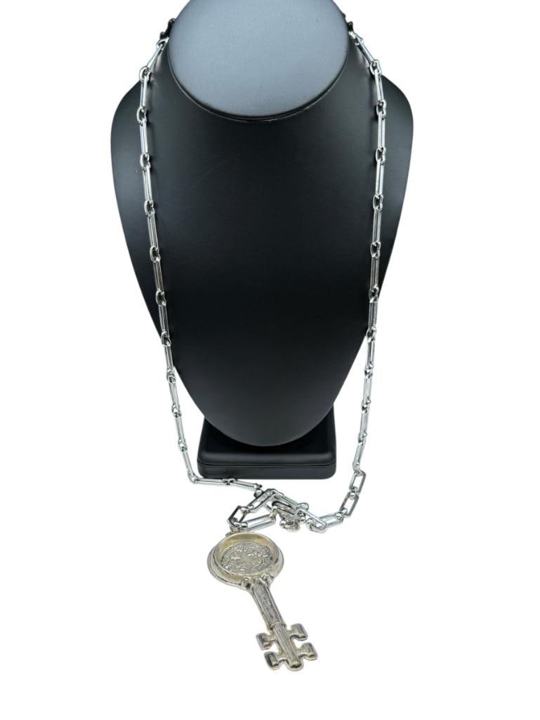 VINTAGE REED & BARTON STERLING SILVER " WINE TASTER'S KEY CIRCA 1880 " FIGURAL KEY PENDANT: ON SILVER TONE LINK NECKLACE 4" KEY, 40" NECKLACE, 20.40 GRAMS OF STERLING