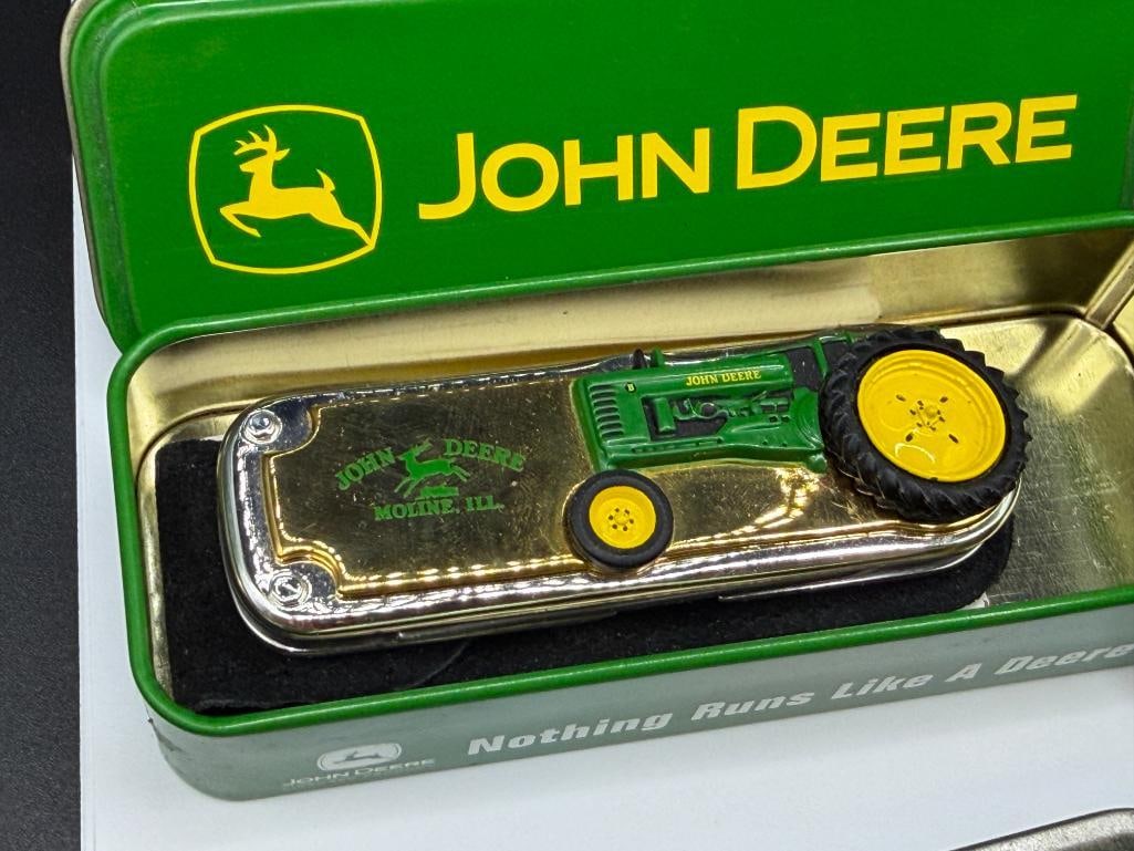THREE JOHN DEERE TRACTOR THEMED POCKET KNIVES INCLUDING TWO CASE XX DYED BONE HANDLE KNIVES - 10