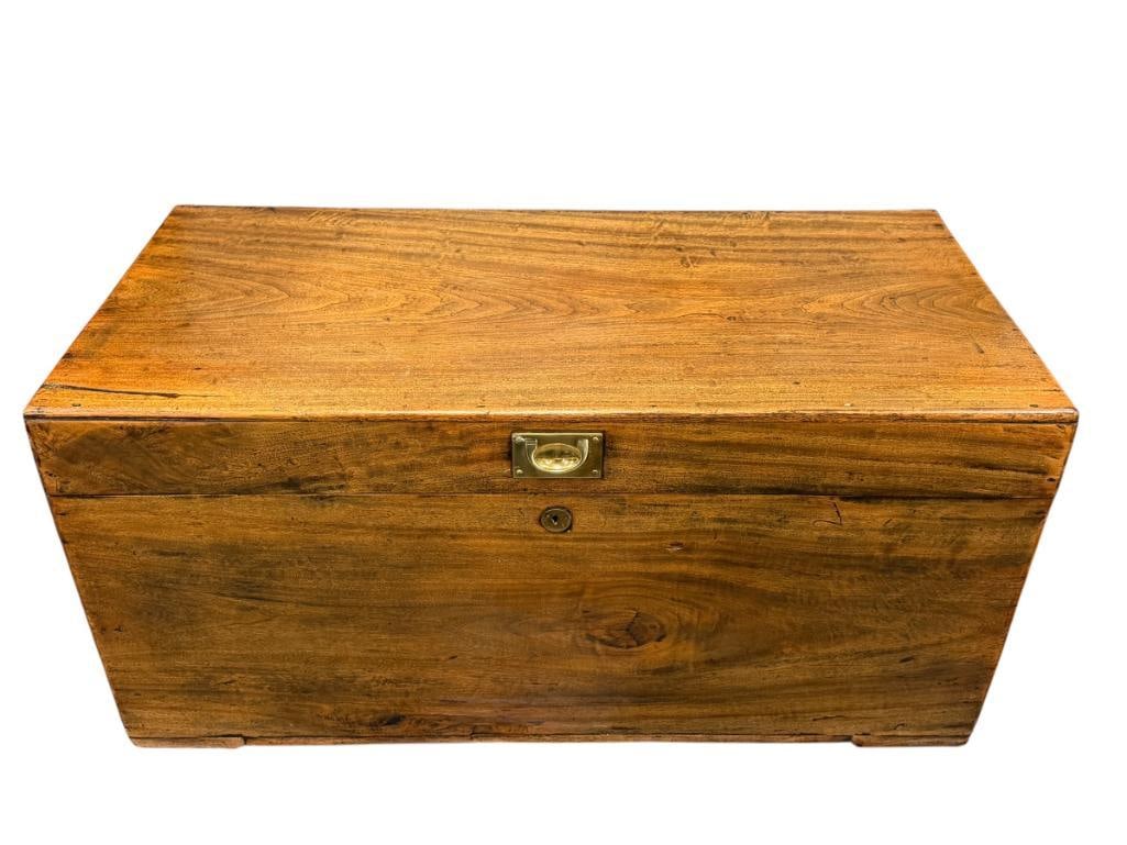 ANTIQUE WALNUT STORAGE CHEST: HINGED TOP WITH ORIGINAL HANDLE AND BRASS TOP HANDLE, TOP HAS SMALL SPLIT LEFT CORNER, MISSING KEY 40" X 19" X 19"