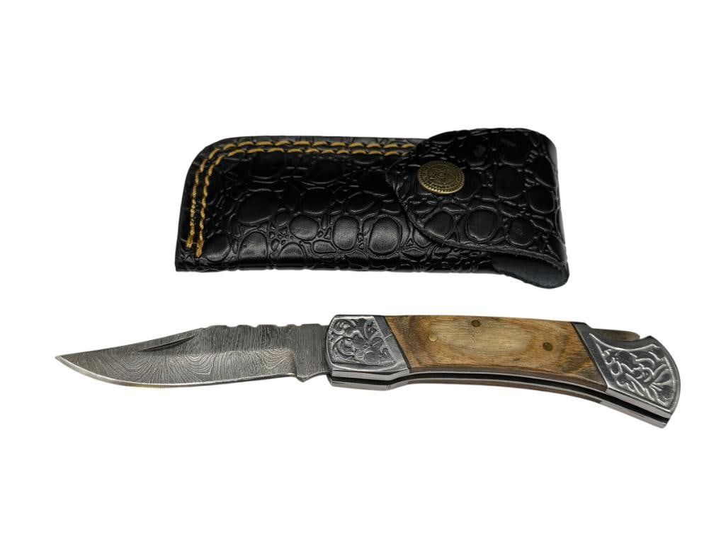 DAMASCUS STEEL FOLDING KNIFE WITH WOOD HANDLE: FEATURES CLIP-POINT BLADE AND INCLUDES A LEATHER SHEATH 2 3/4" BLADE, 7" TOTAL LENGTH