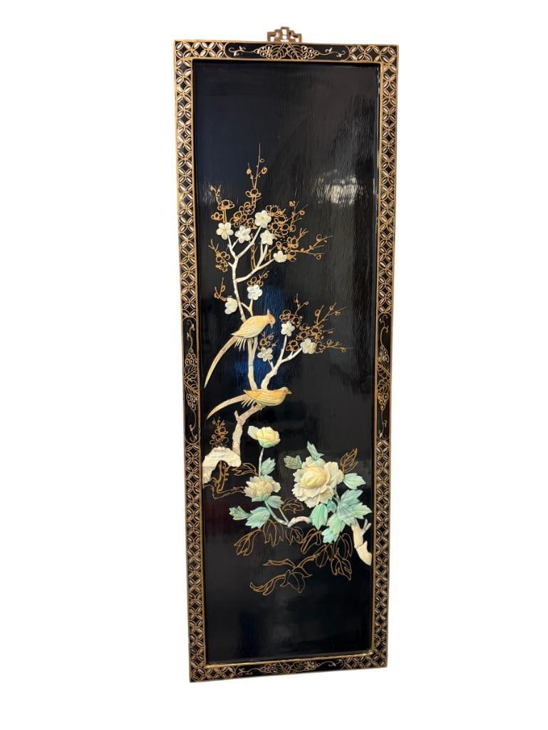 CHINESE BLACK LACQUERED RELIEF PANEL WITH MOTHER OF PEARL AND SILVER AND GILT ACCENTS: RELIEF PANEL MADE FROM MOTHER OF PEARL WITH FLOWERS AND PERCHED BIRDS, DECORATIVE GILT AND SILVER BORDER, ORIGINAL LABEL ON THE BACK 12" X 36"