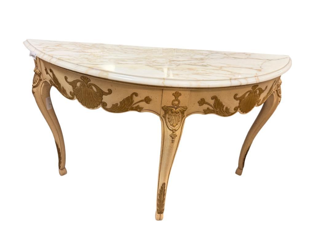 VINTAGE FRENCH PROVINCIAL STYLED CONSOLE TABLE WITH HEAVY MARBLE TOP: IVORY COLORED CONSOLE WITH GILT ACCENT SKIRT AND LEGS, WHITE MARBLE TOP WITH GOLD COLORED VEINS 49" X 15" X 31"