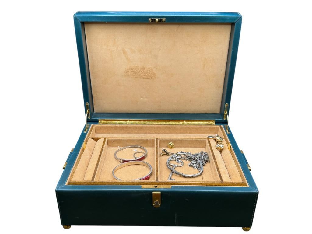 PADDED LEATHER AND SUEDE JEWELRY CASE WITH CONTENTS: INCLUDES A PAIR OF GOLD TONE CUFF LINKS, ALPACA MADE BRACELETS, AND MORE CASE IS 12" X 9" X 4 1/2"
