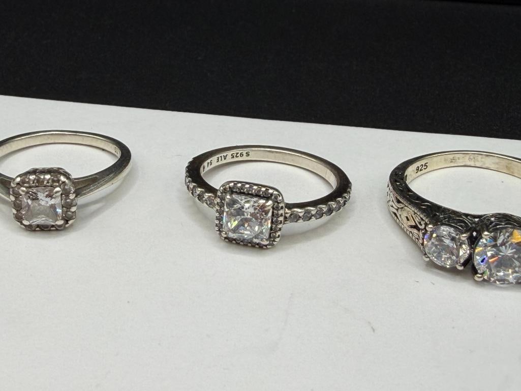 THREE STERLING SILVER CZ ENGAGEMENT STYLE RINGS - 3