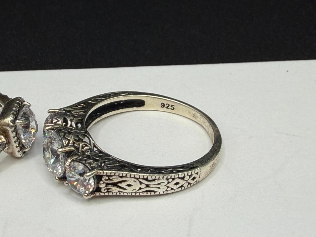THREE STERLING SILVER CZ ENGAGEMENT STYLE RINGS - 6