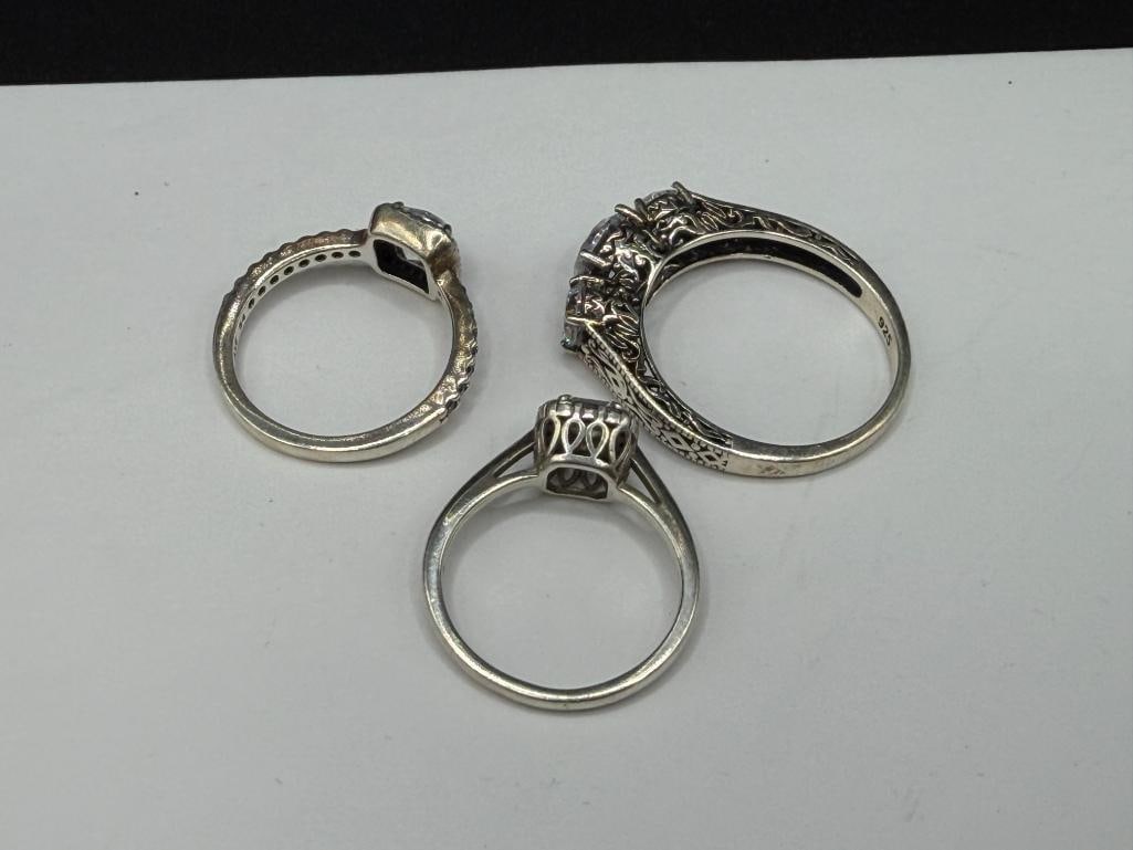 THREE STERLING SILVER CZ ENGAGEMENT STYLE RINGS - 7