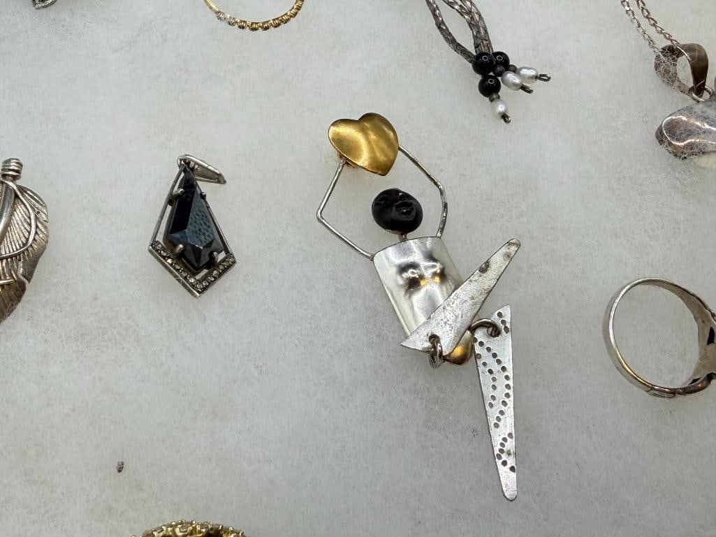 ASSORTED STERLING SILVER JEWELRY FEATURING SIGNED PIECES, RINGS, EARRINGS, AND BRACEELTS - 10