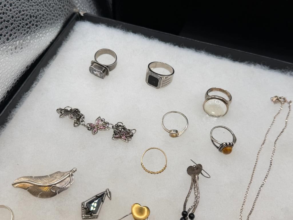 ASSORTED STERLING SILVER JEWELRY FEATURING SIGNED PIECES, RINGS, EARRINGS, AND BRACEELTS - 6