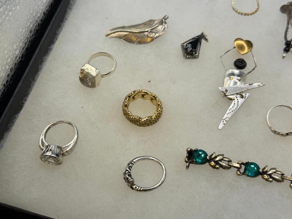 ASSORTED STERLING SILVER JEWELRY FEATURING SIGNED PIECES, RINGS, EARRINGS, AND BRACEELTS - 9