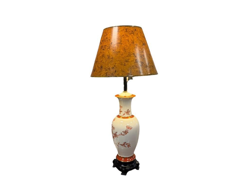 VINTAGE CHINESE PORCELAIN TABLE LAMP WITH HAND PAINTED AND GILT FLORAL DESIGN: FOOTED CAST METAL ROUND BASE, INCLUDES WOOD GRAIN SHADE, TESTED + 33 1/2" H