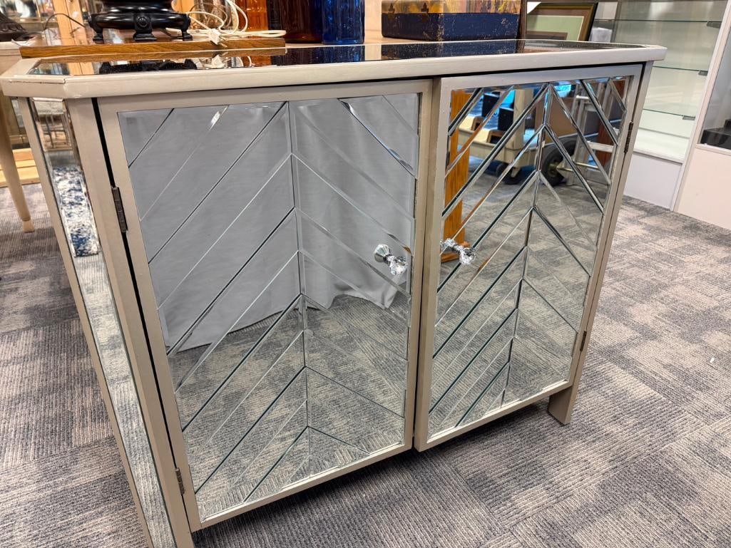 DECORATIVE MIRRORED ACCENT CABINET WITH MIRRORED PANELS AND BEWJELED KNOBS - 17