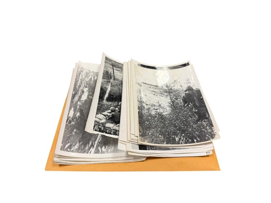 BLACK AND WHITE PHOTOGRAPHS FROM THE KOREAN WAR OVER 35 PHOTOS: INCLUDES PHOTOS OF AMERICAN SOLDIERS, BUILDINGS IN KOREA, SOLDIERS WITH K9S, ETC. FEW ARE STAMPED ON THE BACK, DIV PHOTO LAB 122ND SIG BN AND APPROVED FOR RELEASE PUBLIC INFORMATION OFFICE 7" X 5"