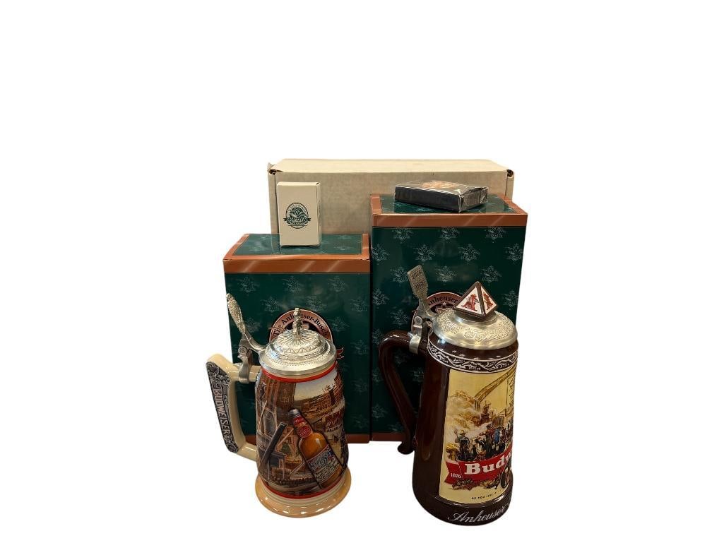 ANHEUSER-BUSCH 1999 AND 2003 MEMBERSHIP STEINS THE GOLDEN AGE OF BREWING AND HISTORICAL ADVERTISING: BOTH WITH PEWTER FLIP LIDS AND DESIGN IN RELIEF, BOTH IN MINT CONDITION WITH ORIGINAL BOXES PLUS SHIPPING BOXES, EACH ALSO INCLUDE MEMBERSHIP RENEWAL GIFTS 9" AND 10" H