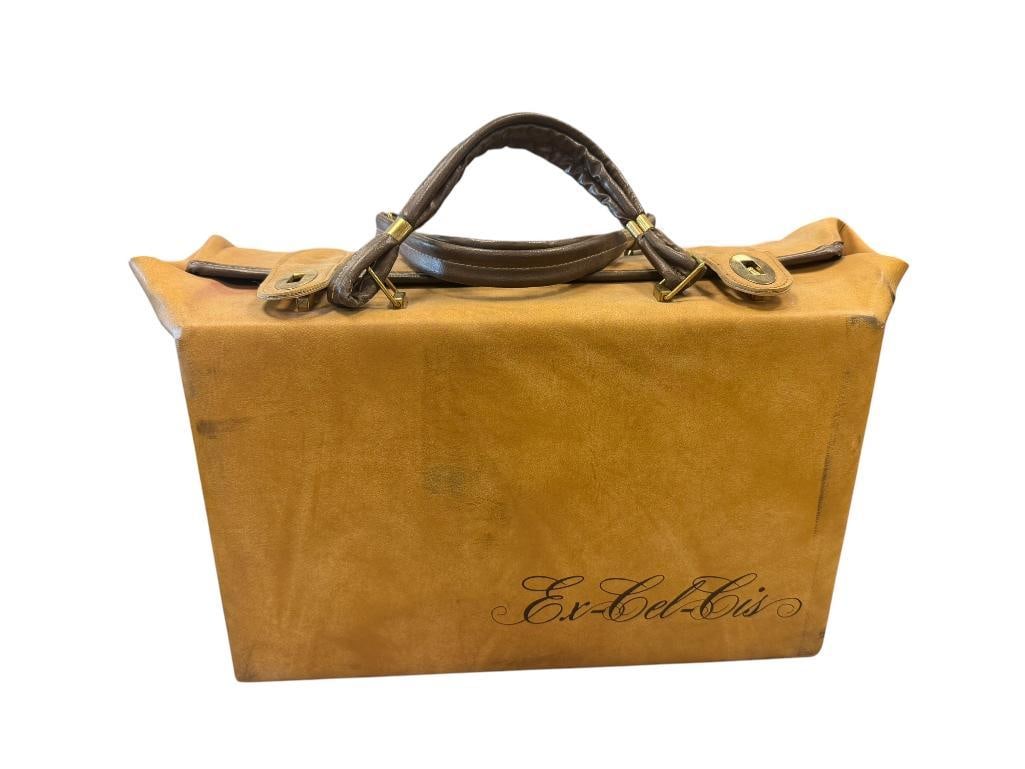 EX-CEL-CIS VINTAGE LUGGAGE BAG WITH TAN PATINA FAUX LEATHER EXTERIOR: DARK BROWN HANDLES WITH BRASS HARDWARE 15" X 7" X 9"