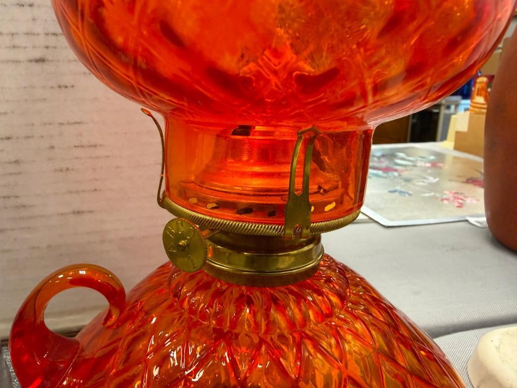 TWO VINTAGE GLASS KEROSENE OIL LANTERN INCLUDING FENTON AMBERINA DIAMOND QUILTED GLASS LAMP - 12