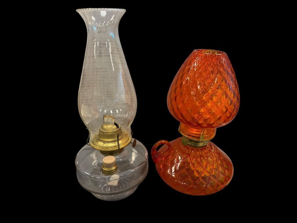 TWO VINTAGE GLASS KEROSENE OIL LANTERN INCLUDING FENTON AMBERINA DIAMOND QUILTED GLASS LAMP: OTHER HAS BRASS EAGLE WICK BURNER, NO CHIPS OR CRACKS LARGEST IS 13" H