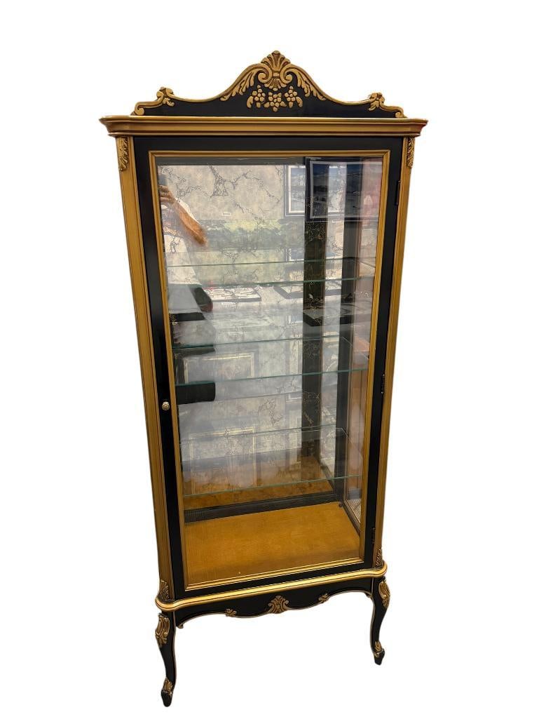 VINTAGE FRENCH PROVINCIAL STYLE CURIO DISPLAY CABINET: FEATURING AN ELEGANT BLACK LACQUER FINISH ACCENTED WITH ORNATE GOLD GILT DETAILING AND CABRIOLE LEGS, GLASS FRONT AND THREE GLASS SHELVES, GOOD CONDITION 24" X 14" X 64"