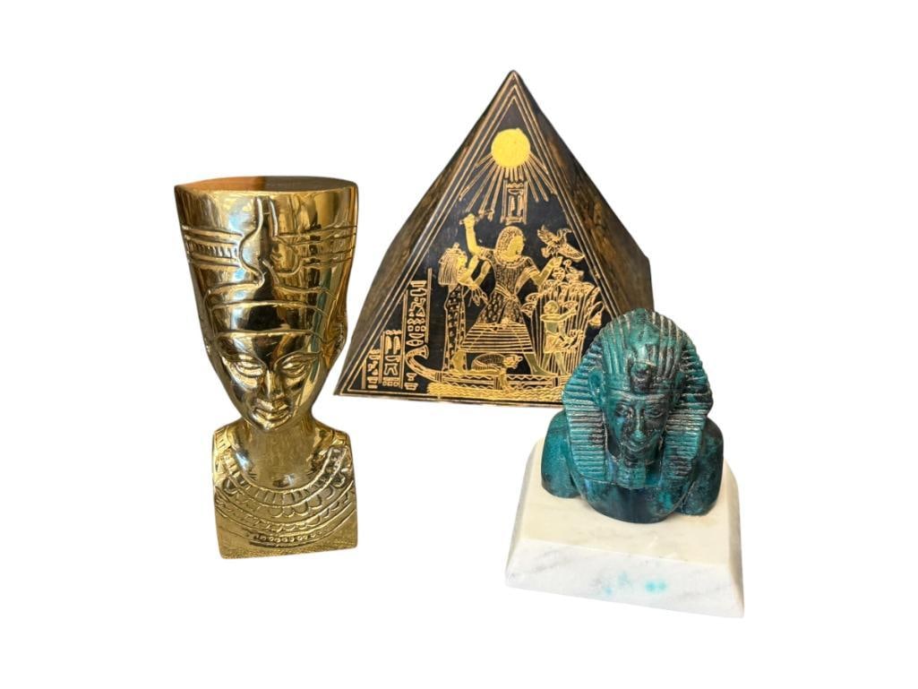 DECORATIVE EGYPTIAN DECOR BUSTS AND PYRAMID: LACQUERED BRASS QUEEN NEFERITI BUST, PHARAOH BUST, AND WEIGHTED ENGRAVED EGYPTIAN REVIVAL BRASS SOUVENIR PYRAMID, FILLED WITH SAND, WITH SCENES OF DAILY LIFE 3 1/2" UP TO 5 1/2" H