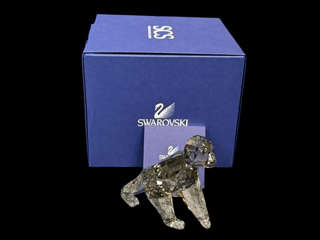 SWAROVSKI CRYSTAL SCS ANNUAL EDITION 2009 GORILLA CLUB DESIGNED BY ANTON HIRZINGER: PART OF THE ENDANGERED WILDLIFE TRILOGY, BLACK DIAMOND CRYSTAL, RETIRED, IN MINT CONDITION WITH ORIGINAL BOX AND CERTIFICATE BOOKLET, NO DAMAGE OR REPAIRS 2 5/8" H