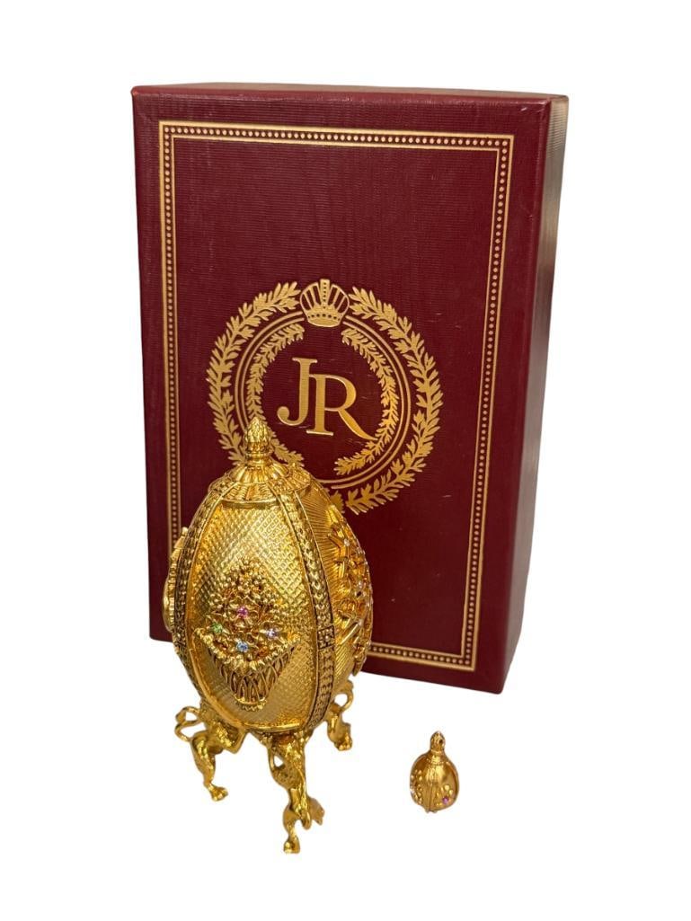 JOAN RIVERS IMPERIAL TREASURES THE FOUR SEASONS EGG: HAND CRAFTED RUSSIAN INSPIRED ART, ENAMELED AND GOLD FINISHED EGG WITH FOUR BEJEWELED PANELS REPRESENTING THE FOUR SEASONS, INCLUDES MINIATURE MATCHING EGG WITH STAND, IN MINT CONDITION WITH ORIGINAL