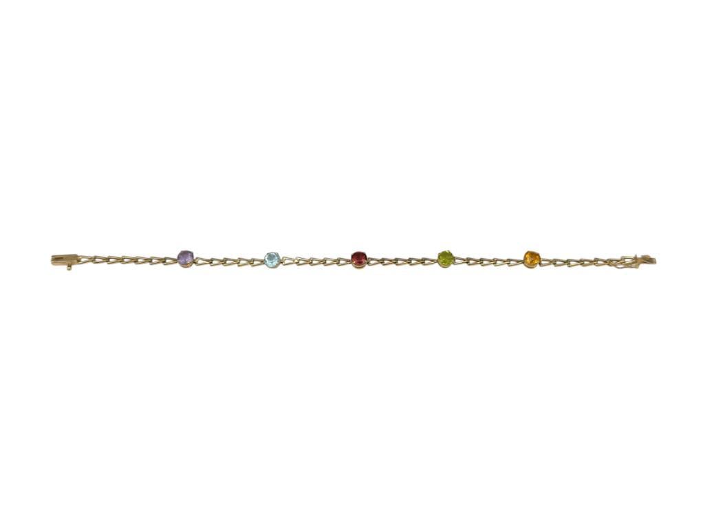 14K YELLOW GOLD ROUND CUT MULTI-GEMSTONE LINK BRACELET INCLUDING PERIDOT, CITRINE, TOPAZ, AND MORE: ALSO INCLUDES AMETHYST AND GARNET 7 1/4" X 1/8", 5MM GEMSTONES, 3.03 GRAMS