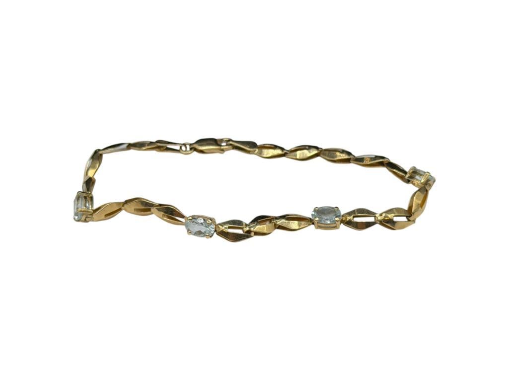 IMPERIAL GOLD COMPANY DESIGNER SIGNED 14K YELLOW GOLD OVAL CUT AQUAMARINE BRACELET: FEATURING FOUR OVAL CUT AQUAMARINES, DESIGNER HALLMARKED WITH "2/2" DOMINO / DICE 7 1/8" X 3/16", 6MM X 4MM AQUAMARINES, 3.58 GRAMS