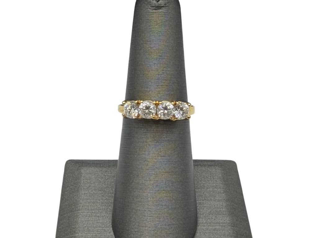 14K YELLOW GOLD ROUND CUT CZ BAND: FEATURING FOUR ROUND BRILLIANT CUT CZS SIZE 6, 3.20 GRAMS, 4MM CZS
