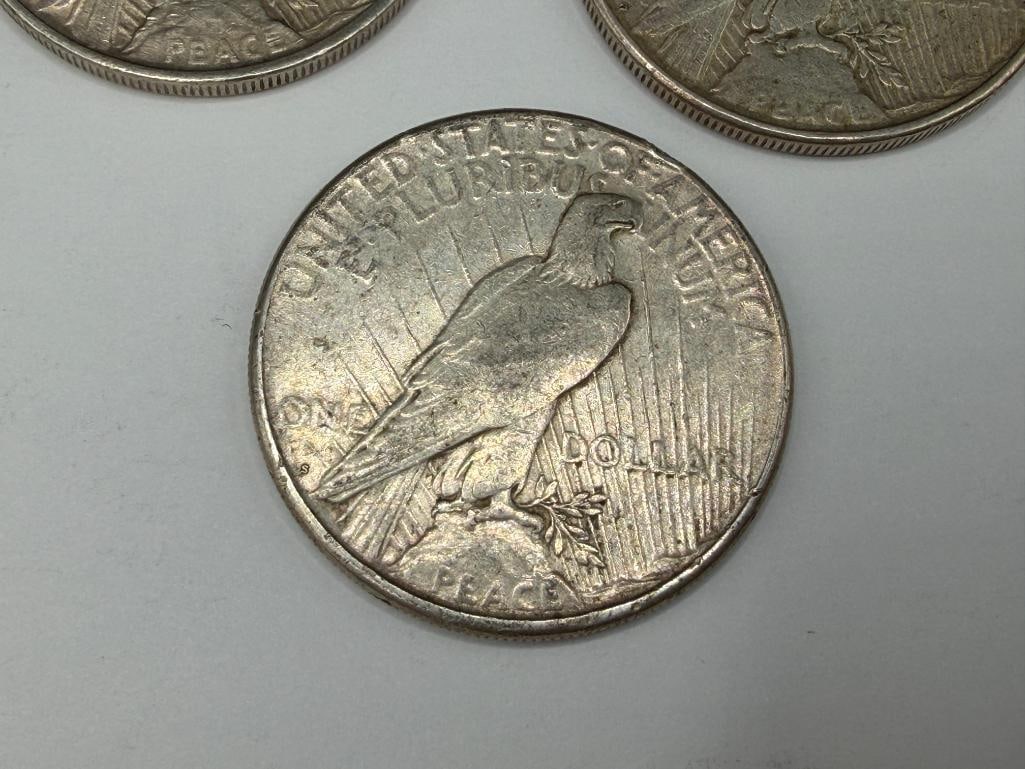 FIVE U.S. PEACE SILVER DOLLARS FEATURING VARIOUS DATES AND MINT MARKS - 7