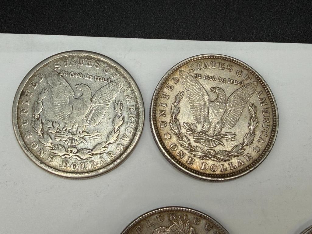 FIVE U.S. MORGAN SILVER DOLLARS FEATURING VARIOUS DATES AND MINT MARKS - 3