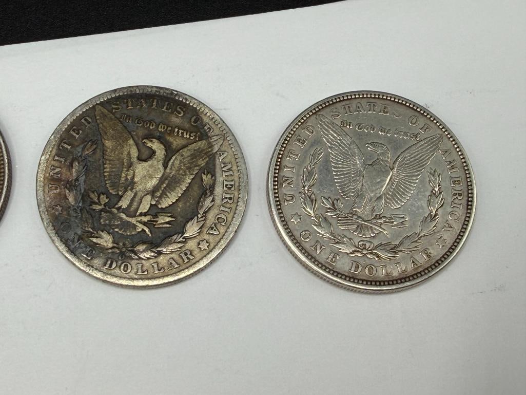 FIVE U.S. MORGAN SILVER DOLLARS FEATURING VARIOUS DATES AND MINT MARKS - 5