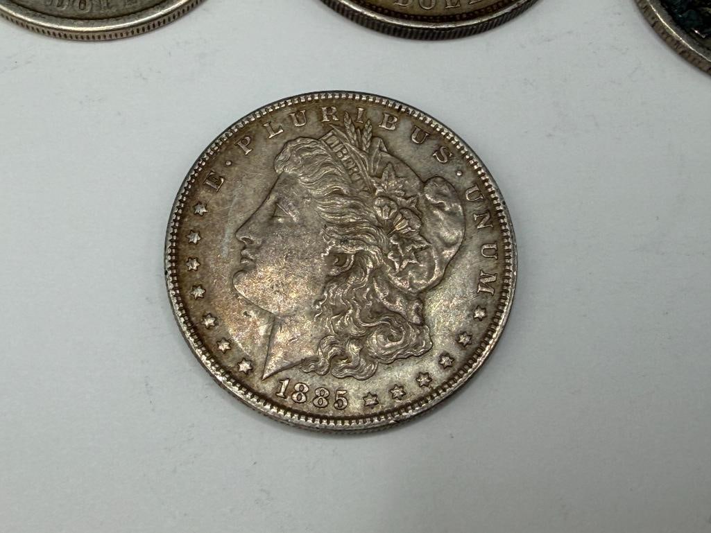 FIVE U.S. MORGAN SILVER DOLLARS FEATURING VARIOUS DATES AND MINT MARKS - 6