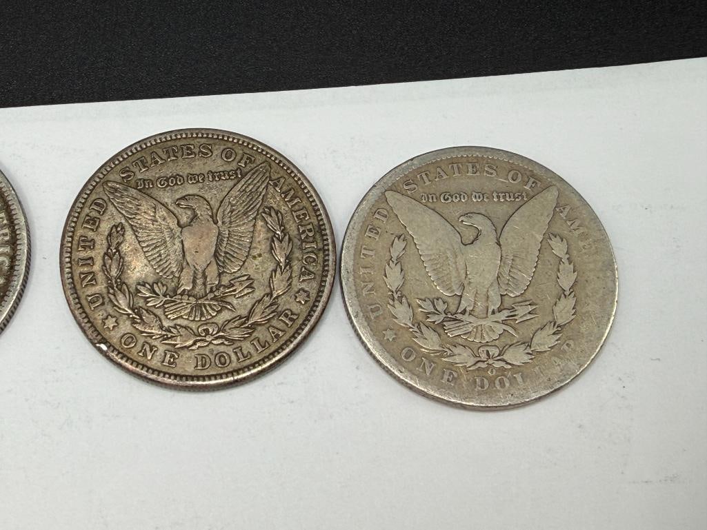 FIVE U.S. MORGAN SILVER DOLLARS FEATURING VARIOUS DATES AND MINT MARKS - 5