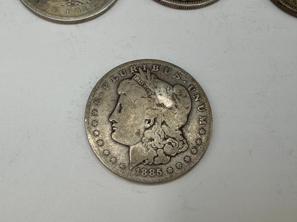 FIVE U.S. MORGAN SILVER DOLLARS FEATURING VARIOUS DATES AND MINT MARKS - 6
