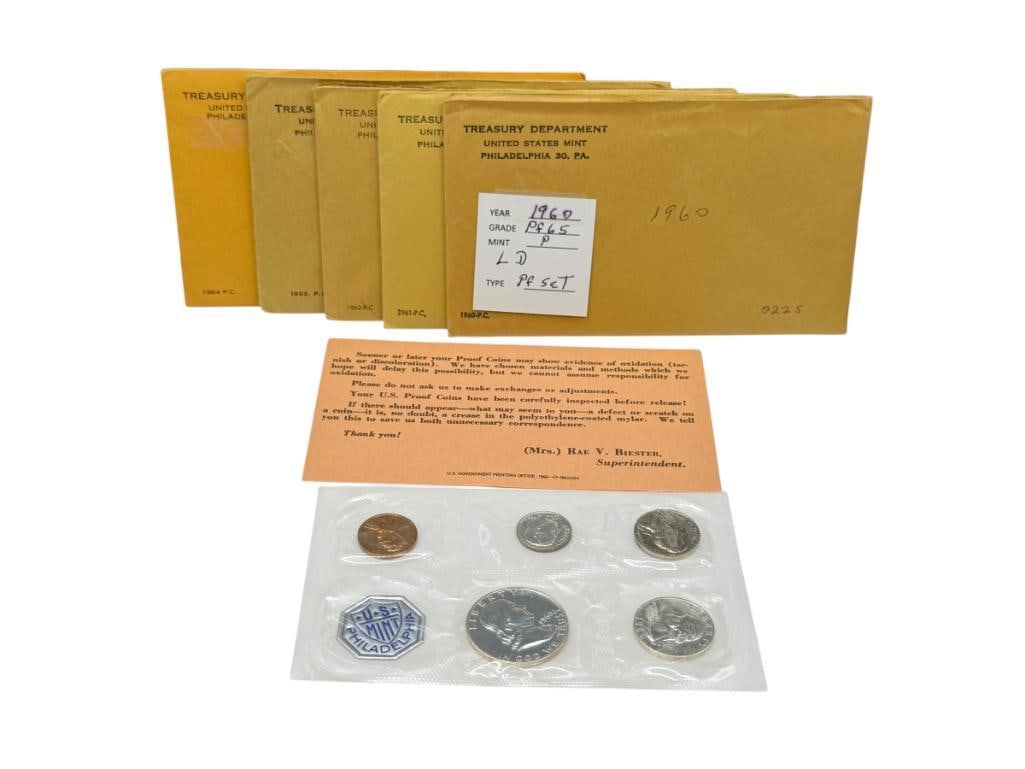 1960 - 1964 U.S. MINT PROOF SETS IN ORIGINAL GOVERNMENT PACKAGING: EACH SET INCLUDES THREE 90% SILVER COINS INCLUDING A HALF DOLLAR, QUARTER, AND DIME
