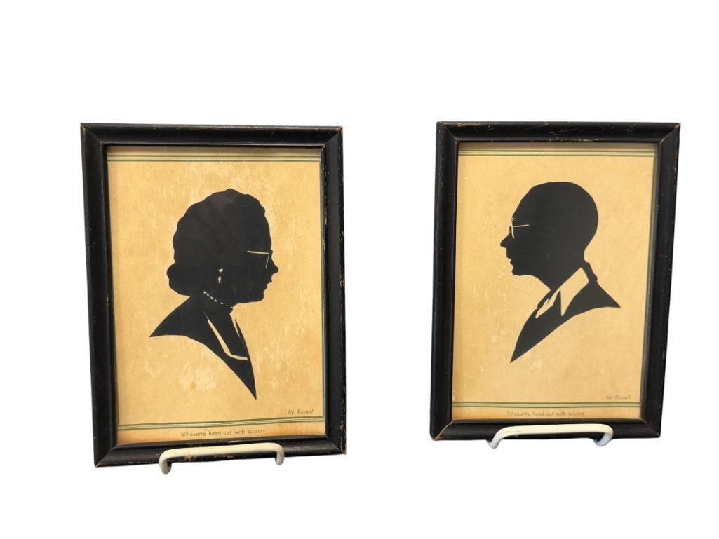 EARLY 20TH CENTURY CUT WORK / SCHERENSCHNITTE SILHOUETTE OF OLDER COUPLE BY RUSSELL: HAND CUT SILHOUETTE WITH SCISSORS, DEPICTS MAN AND WOMAN SIDE VIEW WEARING GLASSES, FRAMED 5 3/4" X 7 3/4" FRAME