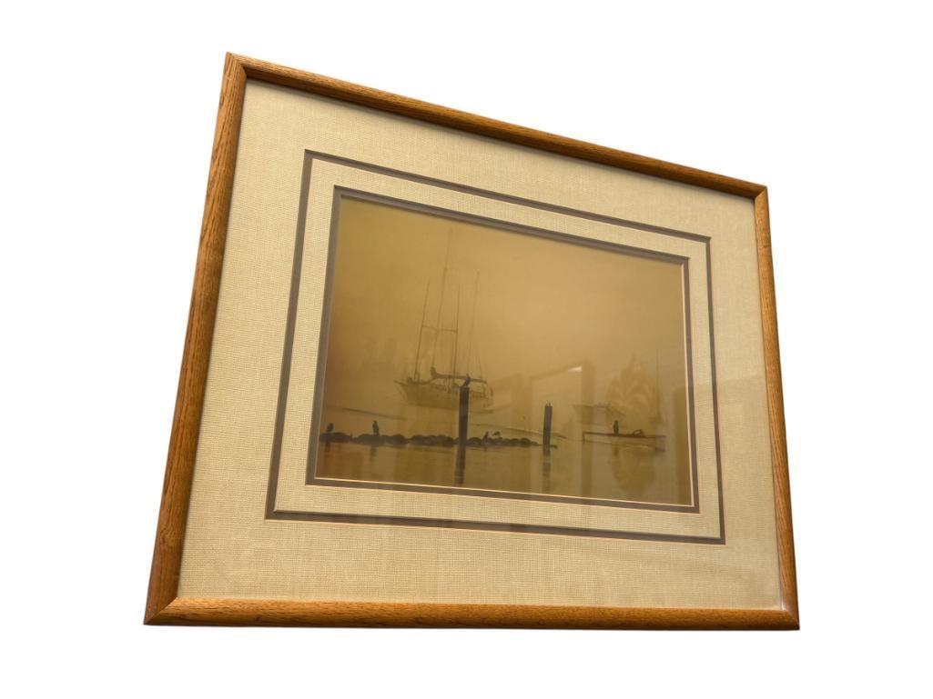 FISHERMAN IN THE FOG, SAUSALITO, CA #91 PHOTOGRAPH: PHOTO DEPICTS FISHERMAN IN A BOAT SURROUNDED BY OTHER BOATS IN THE FOG, MARKED ON THE BACK, FRAMED 21" X 17" FRAME