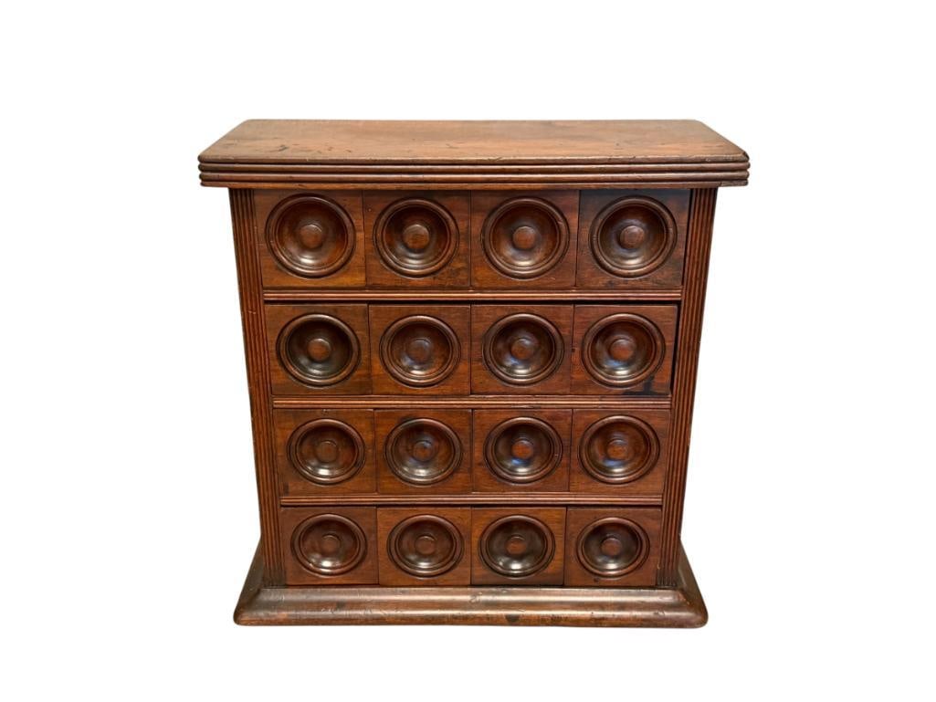 ANTIQUE APOTHECARY / SPICE CABINET WITH 16 DRAWERS WITH CIRCULAR CARVED PULLS: GRID STYLE DESIGN 16" X 6" X 16"