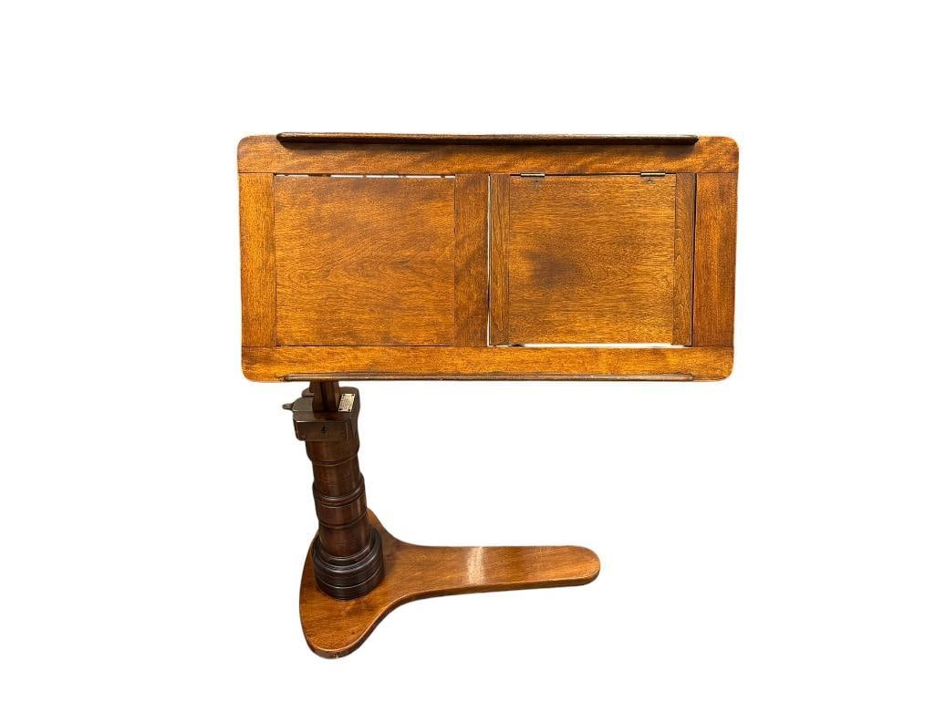 LATE 19TH CENTURY LEVESON & SONS FAMOUS ENGLISH MAKER VICTORIAN WALNUT READING TABLE: ADJUSTABLE SLOPE AND RATCHETING BOOK REST, ORIGINAL LABEL ON THE COLUMN, MADE IN LONDON 43" H