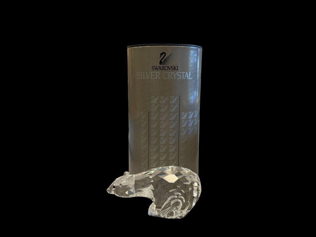 SWAROVSKI CRYSTAL SMALL POLAR BEAR FIGURINE KINGDOM OF ICE AND SNOW NO. 7649NR85: DESIGNED BY ADI STOCKER, RETIRED IN 1997, IN MINT CONDITION WITH CERTIFICATE BOOKLET AND ORIGINAL STORAGE TUBE, NO CHIPS OR REPAIRS 3 1/2" L