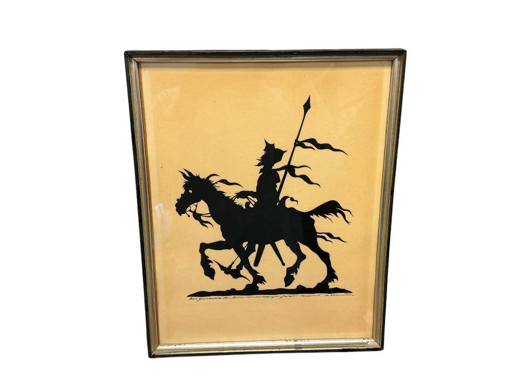 VINTAGE CUT WORK PAPER SILHOUETTE OF DON QUIXOTE AND HIS HORSE ROCINANTE: DON QUIOXTE KNOWN AS THE KNIGHT OF THE SORROWFUL COUNTENANCE AS WRITTEN IN GERMAN ON THE BOTTOM EDGE, SIGNED BY THE ARTIST ON THE BOTTOM, DATED 1953, FRAMED 11 3/4" X 14 1/2" FRAME