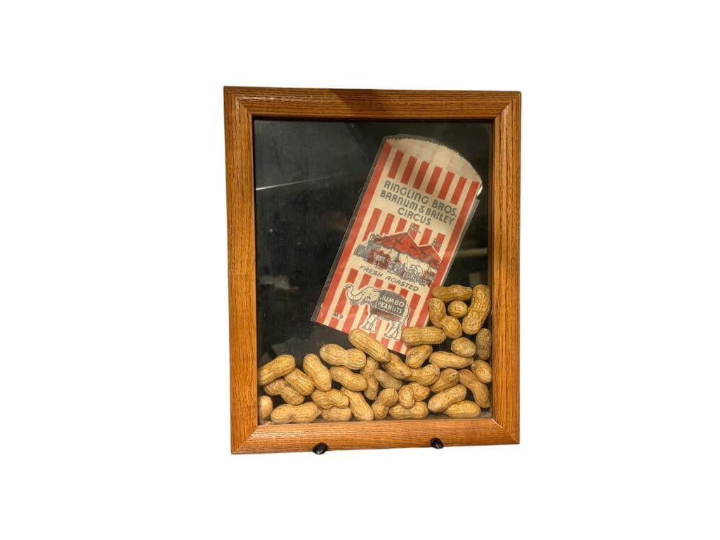 VINTAGE RINGLING BROS BARNUM & BAILEY CIRCUS JUMBO PEANUTS BAG AND PEANUTS IN GLASS SHADOWBOX FRAME: 9" X 11"