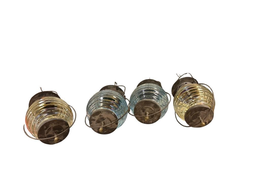 SET OF FOUR OUTDOOR NAUTICAL BOUY TEA-LIGHT CANDLE LANTERNS WITH COLORED GLASS GLOBES: INCLUDES TWO YELLOW GLASS GLOBES AND TWO BLUE GLASS GLOBES, GOOD CONDITION 5" X 5" X 11"