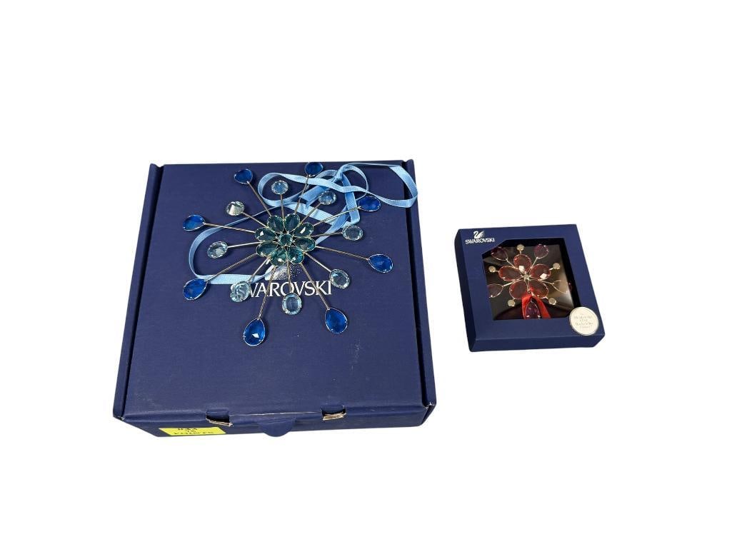 SWAROVSKI CRYSTAL BLUE AND RED STARBURST / FLORAL WINDOW ORNAMENTS FROM JEWEL COLLECTION: BOTH ARE IN MINT CONDITION WITH ORIGINAL BOX 2 3/8" AND 5 1/2"