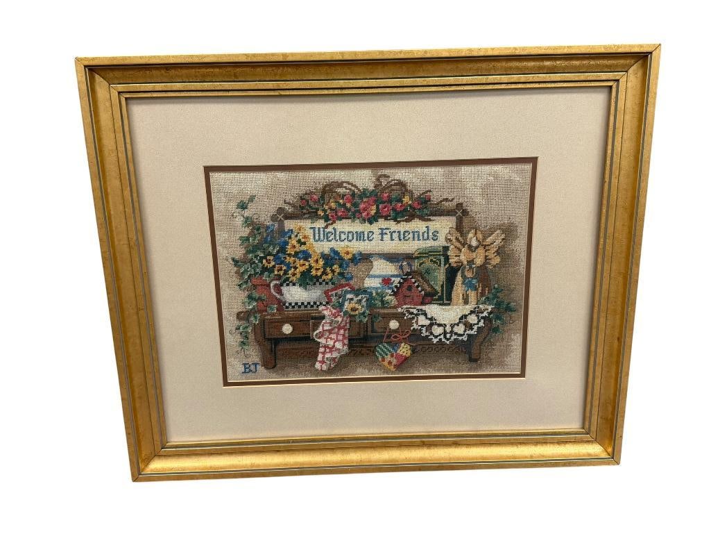 BONNIE J. BULLIS CARSON CITY, NV ARTIST HAND STITCHED CROSS STITCH WELCOME FRIENDS 1998: BONNIE J. BULLIS (1937-2026) WAS BORN IN ARKANSAS, RESIDED IN CARSON CITY WITH HER HUSBAND AND FOUR KIDS, KNOWN FOR NEEDLEPOINTS AND PAINTINGS, TEXTILE SHOWS COUNTRY STYLE BENCH WITH FLOWER POTS,
