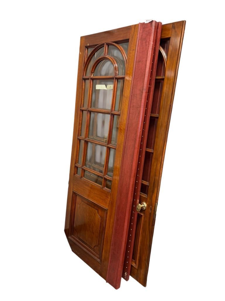 CIRCA 1870'S WALNUT DOORS FROM ENGLAND WITH CUT BEVELED GLASS PANELED WINDOWS: TWO PAIRS OF WALNUT DOORS, WERE INCORPORATED IN A RESTAURANT USED AS DOORS FOR A WINE CABINET 26" X 89"