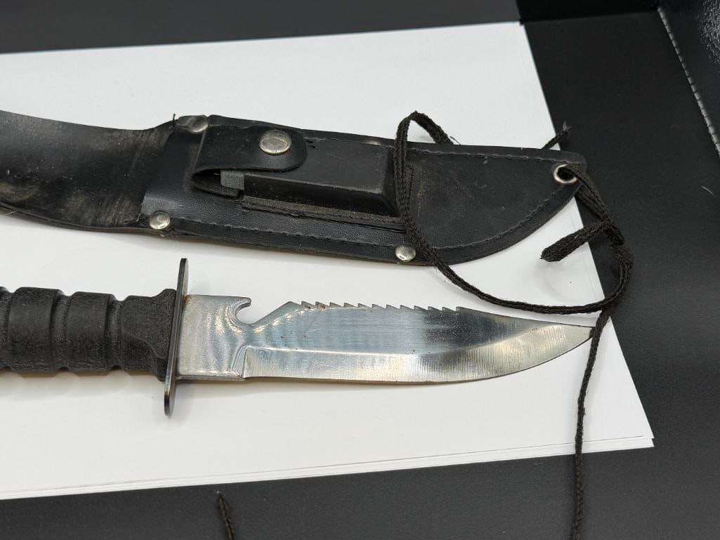 FIXED BLADE SURVIVALIST KNIFE WITH COMPASS AT BASE OF HANDLE, SHARPENING STONE, AND SUPPLIES - 2